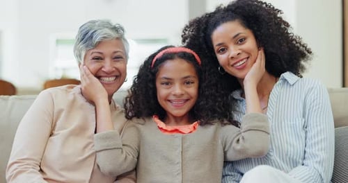 Smile, face and child with mother and grandmother on sofa in the living room of family house