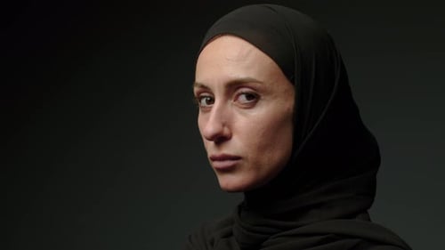 Close Up of Woman with Black Head Covering