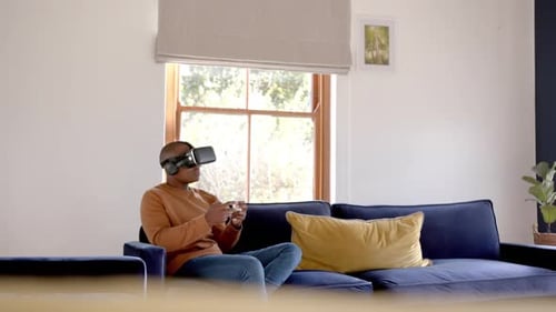 Person Playing VR Video Games Indoors