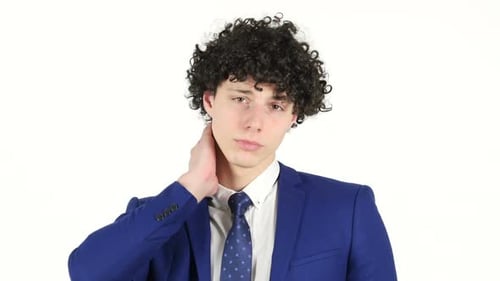 Young Man in Suit Massaging Neck