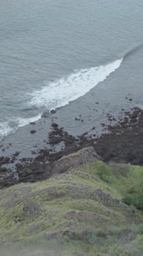 Experience the mesmerizing patterns of ocean waves from an aerial perspective, capturing their dynam