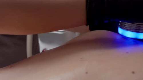 Aesthetician Providing Cosmetic Procedure in Clinic