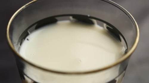 Pouring Milk on a Glass