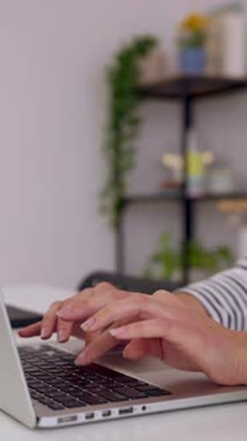 Close Up Female Hands Typing on Computer Sitting in the Office