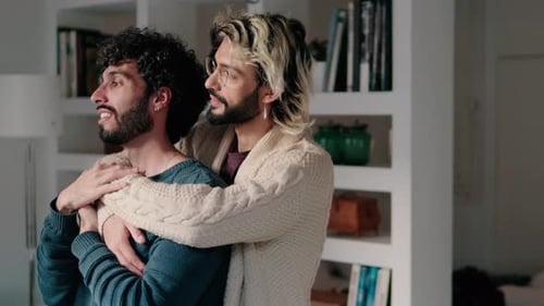 Gay Couple Embracing at Home