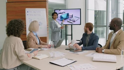 Woman Showing Listeners New Version of VR Set