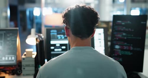 Man, computer and screen with developer coding in office for programming, system update and testing