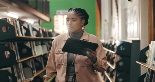 College, African woman and stock check with tablet in campus library for study or online course