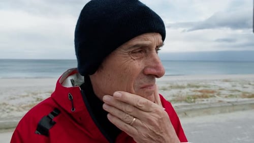 Man Having Doubts At The Beach