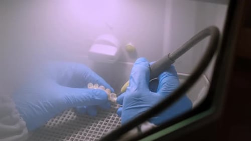 Dental Implants being Constructed in Lab with Tool