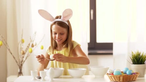 Easter, Holidays and People Concept - Happy Girl Wearing Bunny Ears Headband
