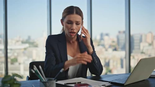 Upset Manager Talking Smartphone in Panoramic Office Sad Woman Hearing Bad News