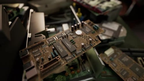 Old Computer Floppy Disk and Motherboard