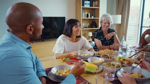 Group of Friends Enjoying a Meal Together at Home
