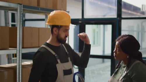 Warehouse Workers Analyzing Inventory