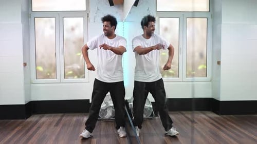 Afro Hip Hop Dancers Practicing Choreography in Dance Studio