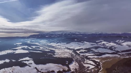 Aerial view of serene winter mountains and valleys