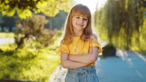 Portrait of Happy Preteen Child Girl Face Smiling Looking at Camera Good Mood Satisfied on Park