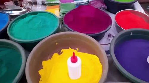 Colorful powder for sale on the festive occasion of Holi in India. Holi colorful powder, piles of po