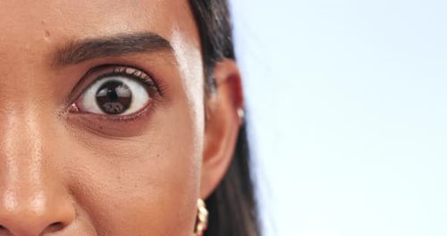 Eye, woman and studio with closeup and eye health and care with cosmetics in studio