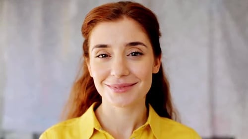 Smiling Woman in Close Up Portrait