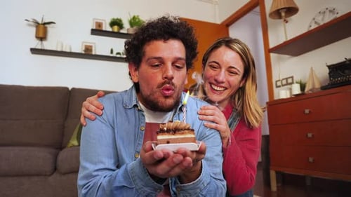 Happy Couple Celebrating Birthday Together at Home