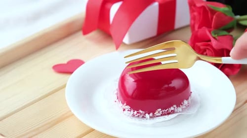 Heart Shaped Dessert Being Cut with a Fork