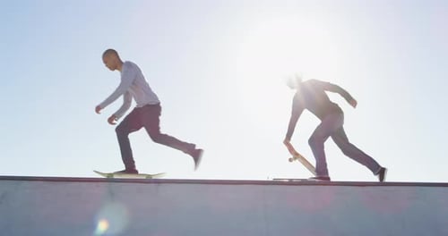 Men, people and skateboard with jump outdoor at park for sport, freedom