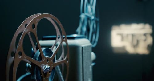 Vintage Movie Projector on Table With Cinematic Dramatic Lighting