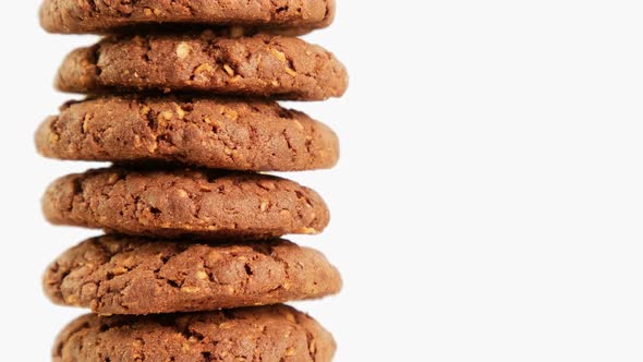 Stack of Chocolate Oatmeal Cookies Rotating on White Background, Food ...