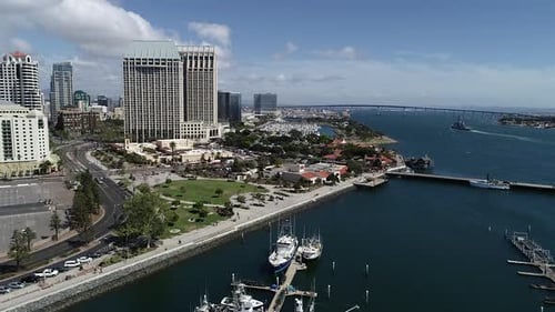 Fishing Pier and Embarcadero Boardwalk with San Diego Skyline 4k