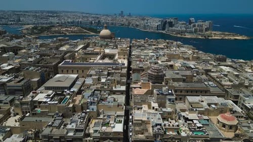 Pullback aerial reveal of Malta's capital city, Valletta
