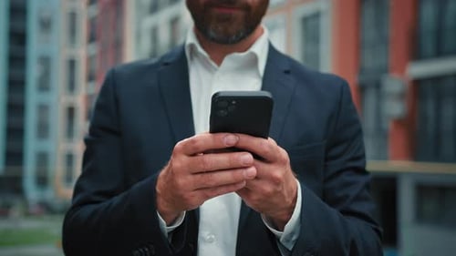 Businessman Unknown Man Stand in City Hold Phone Gadget Send Messages Virtual Communication Make