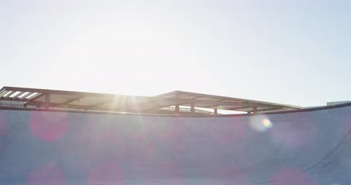 Skateboarders Performing Stunts at a Skate Park