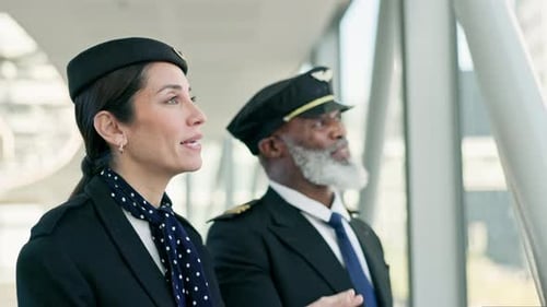 Travel, pilot and stewardess in conversation at the airport before boarding a flight in the city