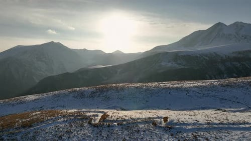 Aerial view of Majestic landscape of the Caucasus mountains at sunset.