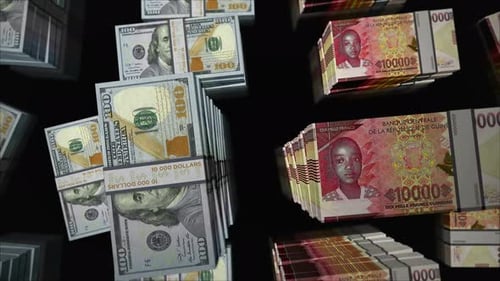 US Dollar and Guinea francs money exchange loop
