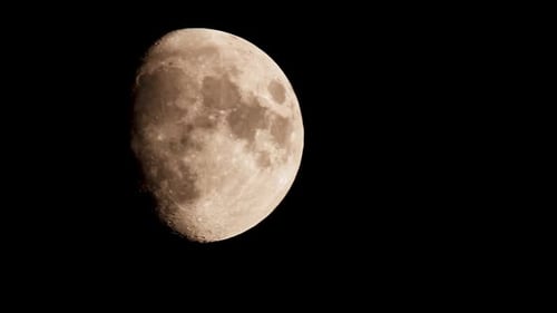 Waxing Gibbous Moon Details Against Black Sky