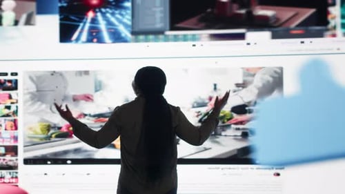 Data Center Technician Runs Equipment Checkups Using Laptop Computer