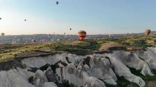 Hot Air Balloons Soaring Over Cappadocia's Unique Landscape