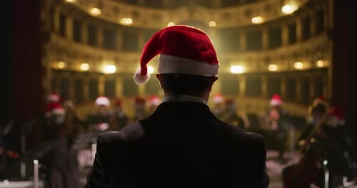 Orchestra in Santa Hats Performing Festive Christmas Music