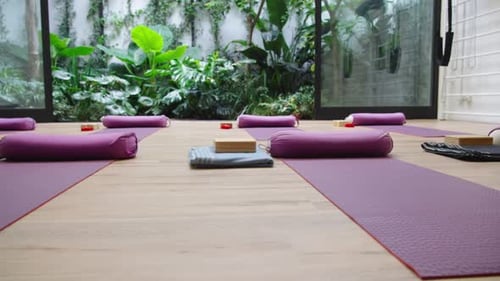 Inviting Yoga Studio with Mats and Natural Light