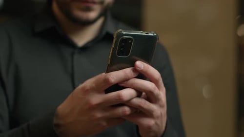 Close Up Male Hands Typing Message Texting Sms Chatting on Smartphone Screen Unknown Man Businessman