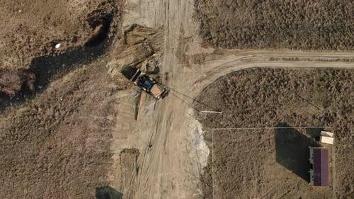 Aerial View of a Tractor That Performs Excavation Work