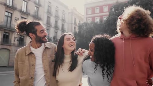 Slow Motion of a Cheerful Happy Friends Laughing While Walking in the Street of a City People Having