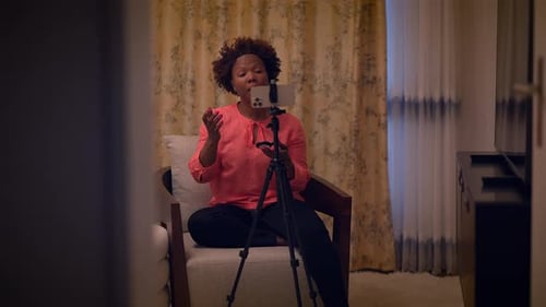 Woman Filming Beauty Vlog at Home