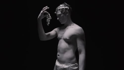Creepy White Statue Looks at the Grapes Then Turns and Looks at the Camera