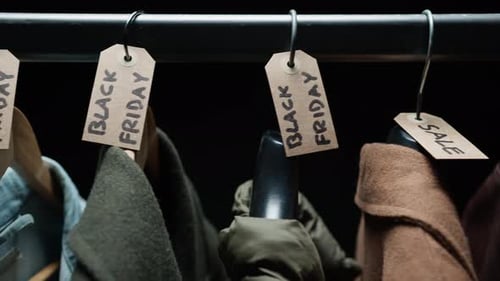 Rack of Coats with Black Friday Sale Tags