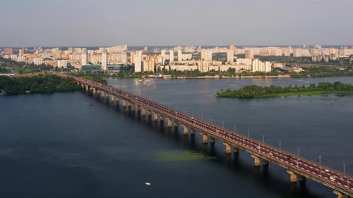 Aerial View of City River Bridge with Moderate Car Traffic