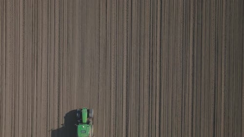Tractor Plowing Field Aerial Birds Eye View